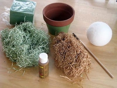 craft grass and paint and flower pot and styrofoam ball