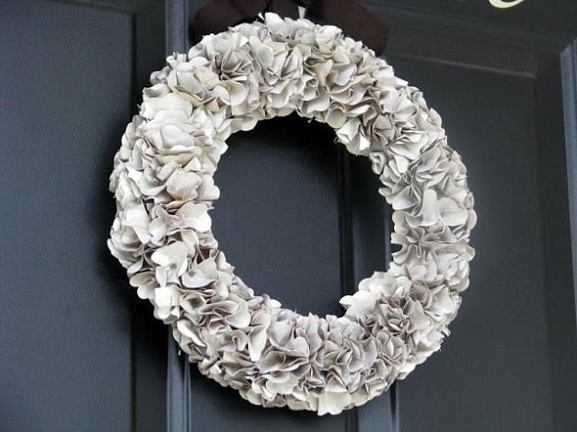 brown paper bag wreath on black door