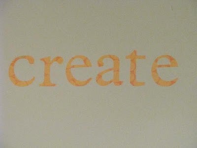 scrapbook lettering on wall spelling the word: create
