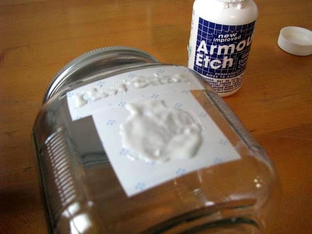jar with acid etching cream over stencil