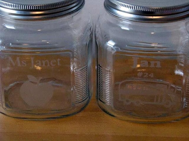 jars with finished acid etched apple and bus designs