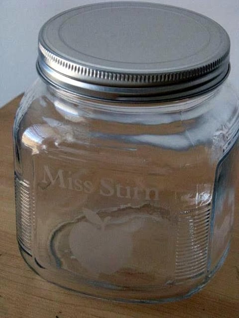 finished acid etched jar with apple design