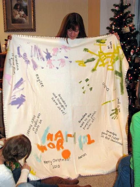 grandma opening fleece blanket gift