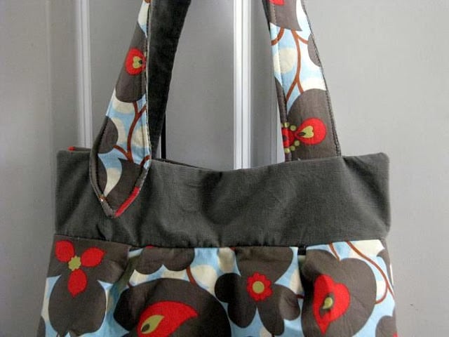 grey and floral handbag