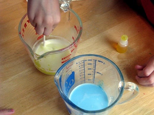 adding coloring to melted soap