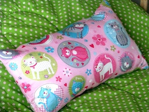 pink pillow with cat print
