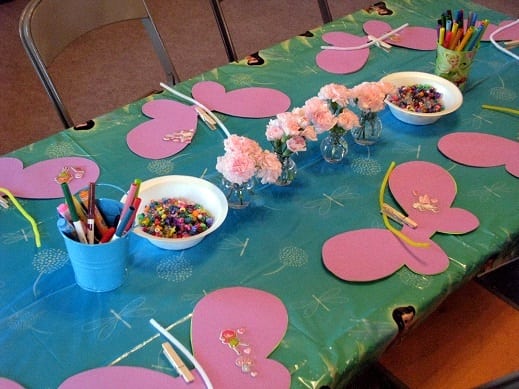 fairy wing station on table with paper wings and markers