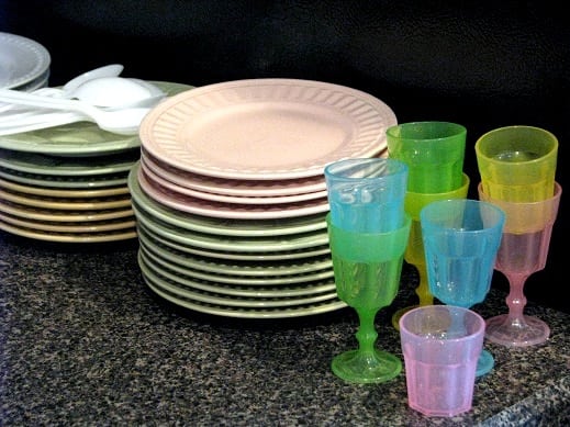 stack of small plates and cups for party