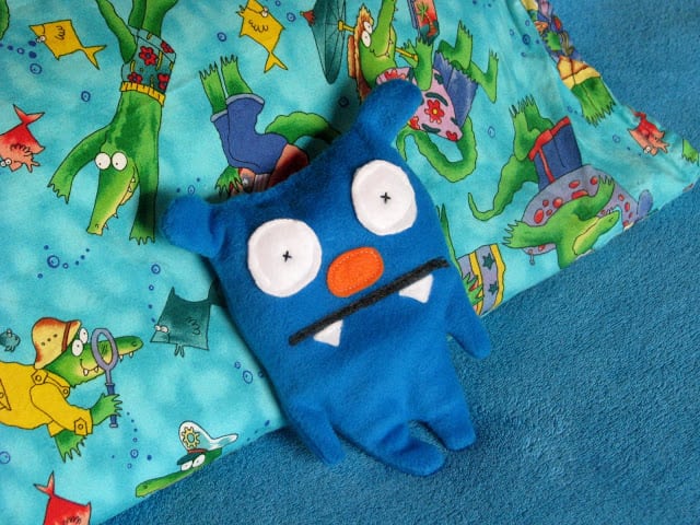 blue ugly doll shaped rice bag