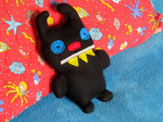 black ugly doll rice bag