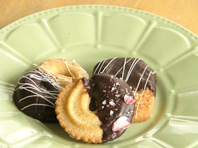 chocolate dipped danish cookies on green plate