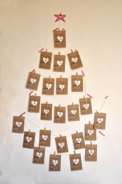 brown paper cards on wall arranged to look like a tree