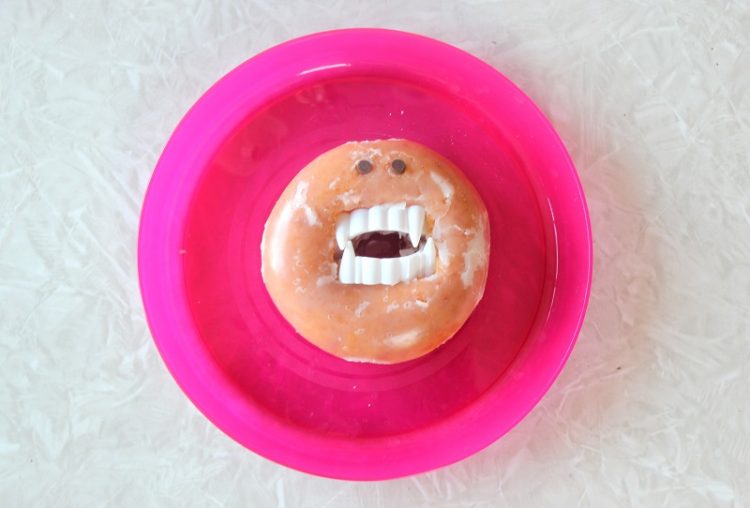 Are you ready to make the SILLIEST not-so-spooky Halloween treats? These vampire donuts come together in about 30 seconds. So easy and fun!