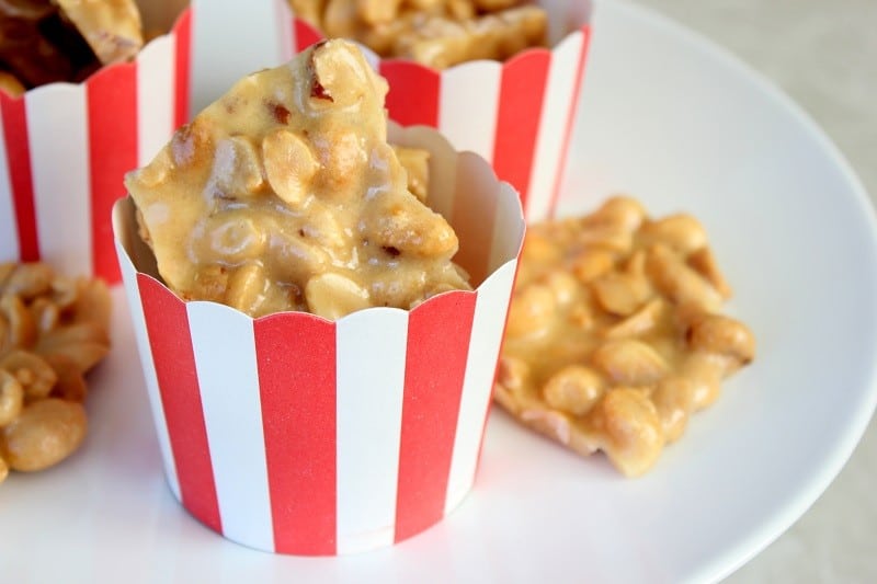 small cups of peanut brittle