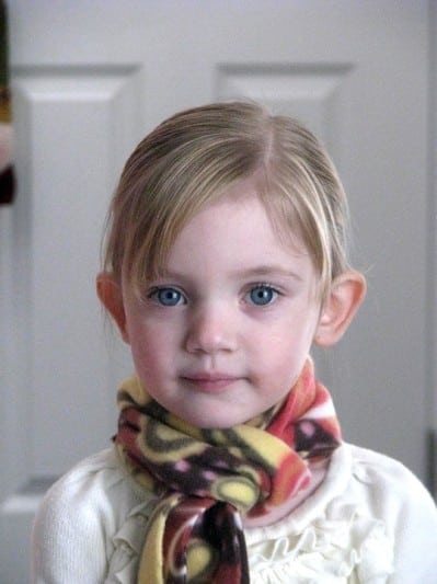 girl wearing fleece scarf