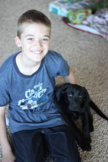 boy with puppy