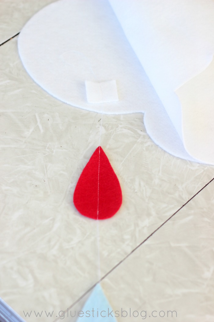 red rain drop stitched to cloud mobile