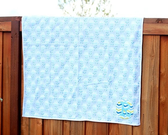 baby blanket on fence