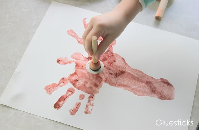 This darling little reindeer is such a fun way to document those little hands and feet! The perfect preschool reindeer craft for kids!