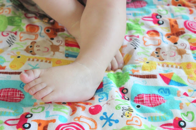 baby feet on quilt