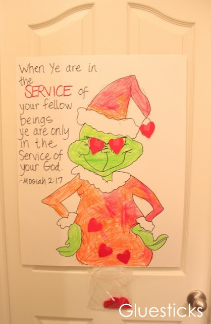 grinch poster attached to door