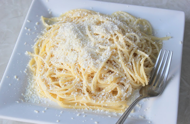 pasta with cheese and butter on white plate