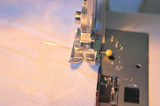 sewing machine stitching fabric