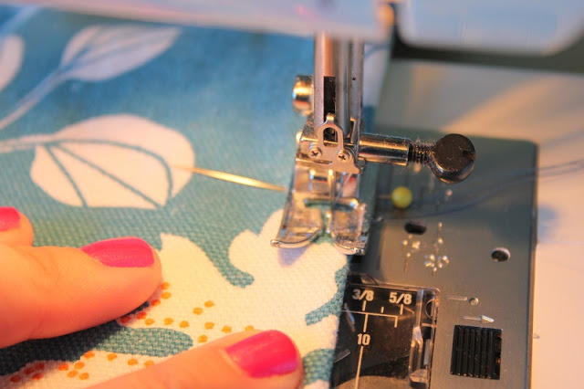 sewing machine sewing fabric