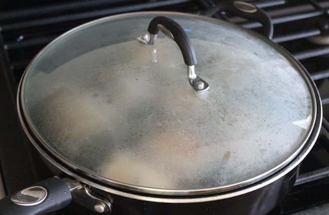 chicken Florentine cooking in pan