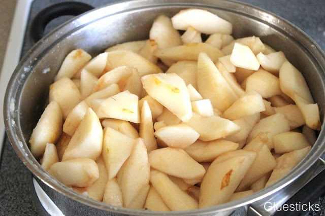 peeled and sliced pears in pot