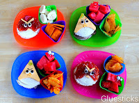 angry bird sandwiches on colored plates