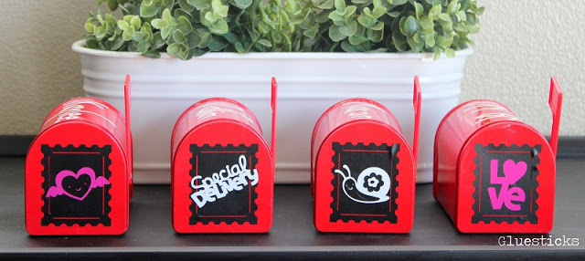 valentine mail boxes lined up on table