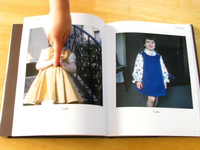 open photo book with photos of homemade dresses