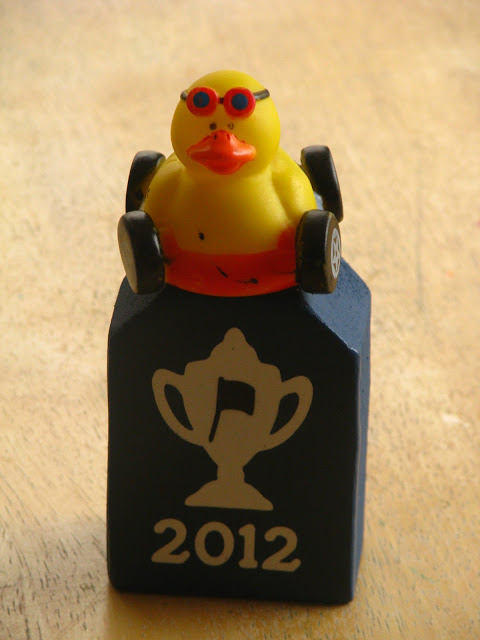 wood pinewood derby trophy with rubber duck