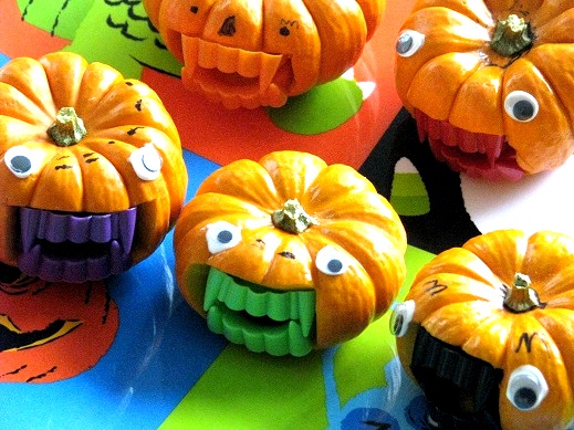 mini pumpkins with fangs