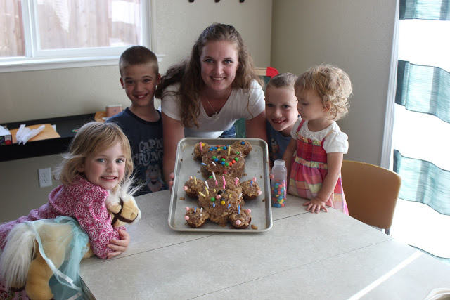 children and mom with teddy bear cake