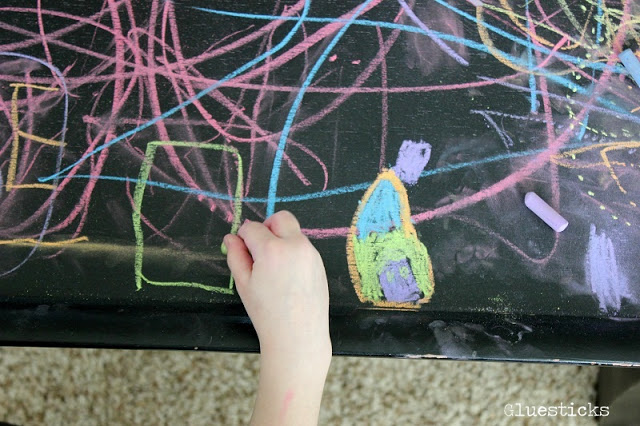 hand drawing with chalk on table