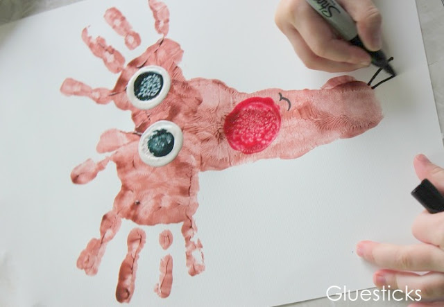 This darling little reindeer is such a fun way to document those little hands and feet! The perfect preschool reindeer craft for kids!