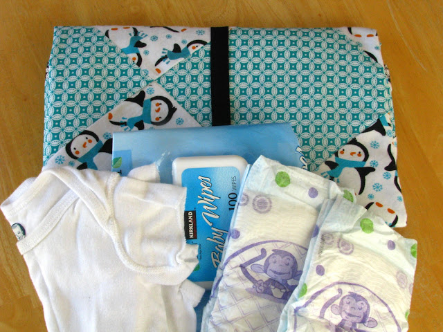 finished play and changing mat with diapers and wipes