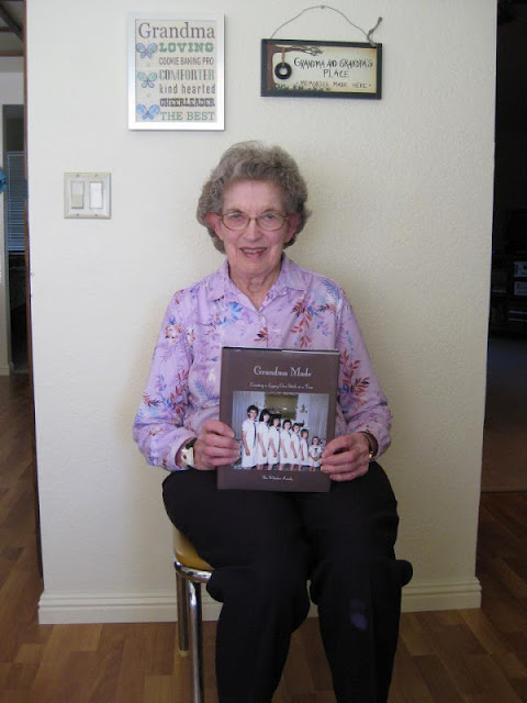 grandma holding sewing book