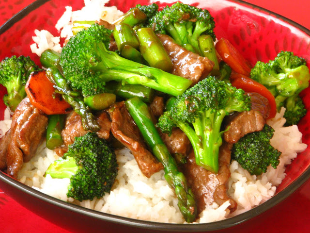 broccoli and asparagus over steak stir fry