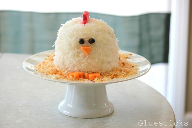 chicken themed cake on white cake stand