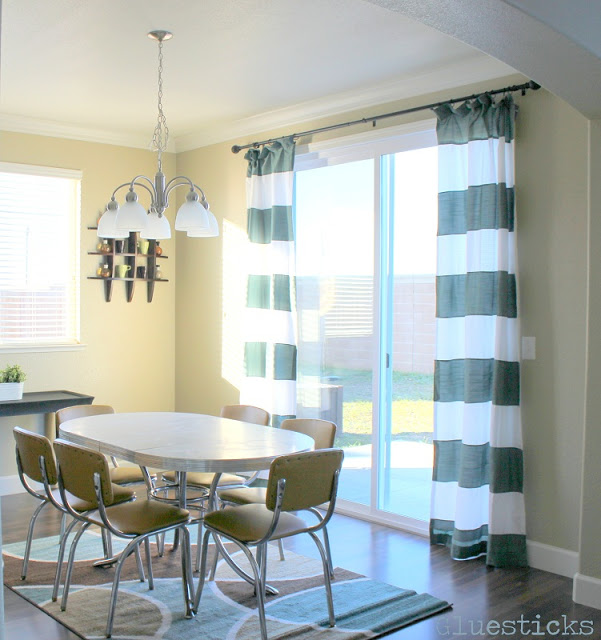 grey and white horizontal striped curtains in dining room