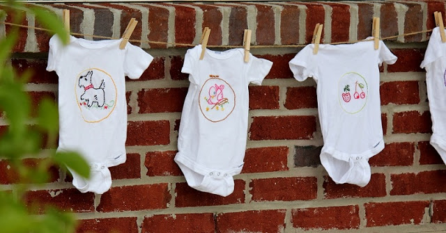 white embroidered onesies