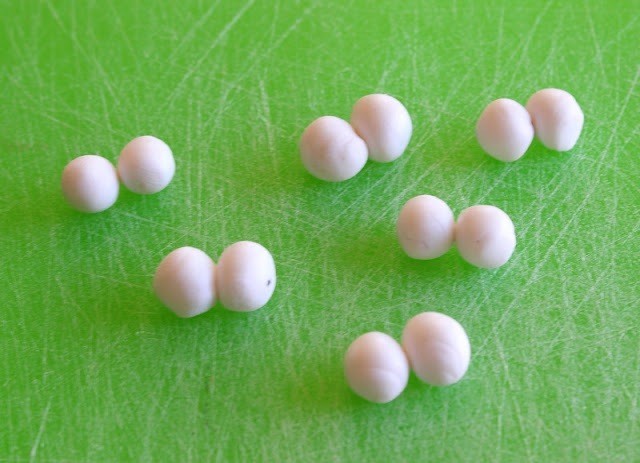 white balls of polymer clay for eyes