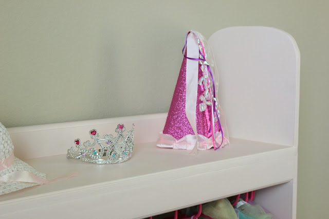 tiaras on top of dress up box