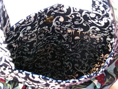 inside handbag showing lining and pockets