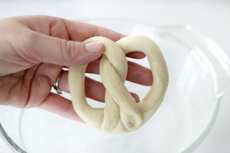 pretzel dough twisted into pretzel shape