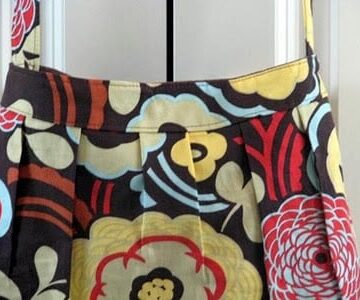 floral handbag handing on door handle