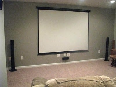 grey wall with movie projector screen mounted